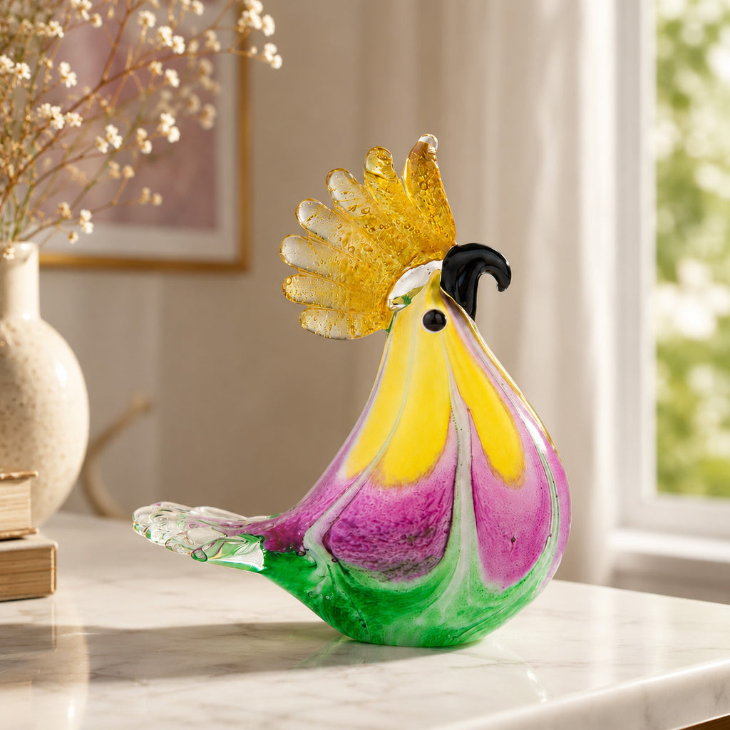 Glass cockatoo desktop decor styled on luxury home office bookshelf